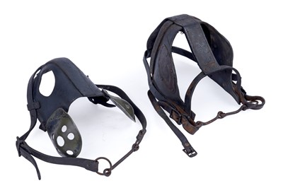 Lot 464 - Two leather pit pony masks