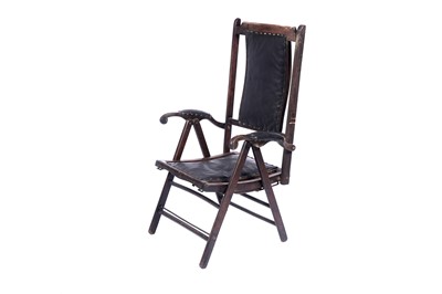 Lot 632 - A late 19th Century beech framed campaign armchair