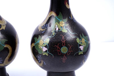 Lot 348 - A pair of Chinese cloisonne dragon vases