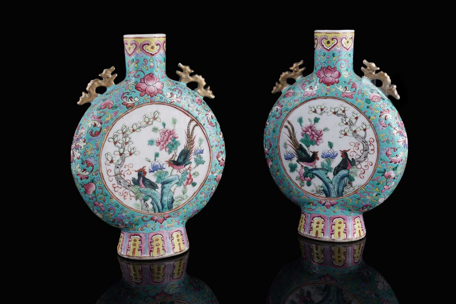 Lot 306 - A pair of Cantonese 'famille rose' moon flasks