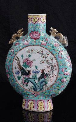 Lot 306 - A pair of Cantonese 'famille rose' moon flasks