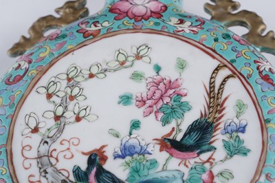 Lot 306 - A pair of Cantonese 'famille rose' moon flasks