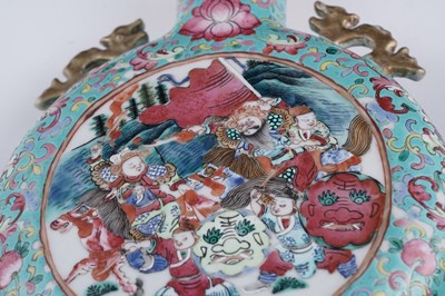 Lot 306 - A pair of Cantonese 'famille rose' moon flasks