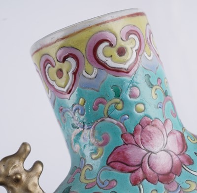 Lot 306 - A pair of Cantonese 'famille rose' moon flasks