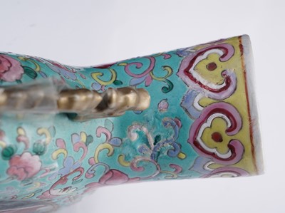 Lot 306 - A pair of Cantonese 'famille rose' moon flasks