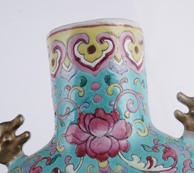 Lot 306 - A pair of Cantonese 'famille rose' moon flasks