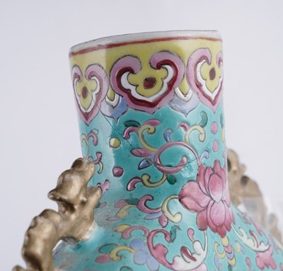 Lot 306 - A pair of Cantonese 'famille rose' moon flasks