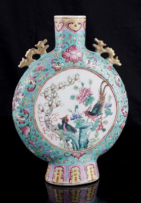 Lot 306 - A pair of Cantonese 'famille rose' moon flasks
