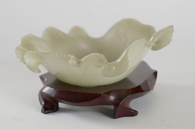 Lot 345 - A Bowenite lily bowl; and a celadon lotus bowl