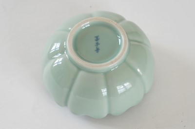Lot 345 - A Bowenite lily bowl; and a celadon lotus bowl