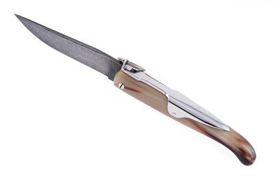Lot 492 - A horn handled Jacques Mongin ring lock folding knife