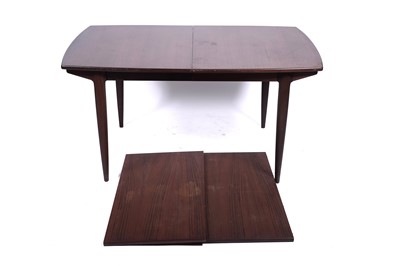 Lot 3 - Greaves and Thomas: an oblong teak extending dining table and eight chairs