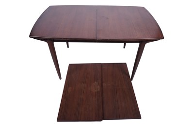 Lot 3 - Greaves and Thomas: an oblong teak extending dining table and eight chairs
