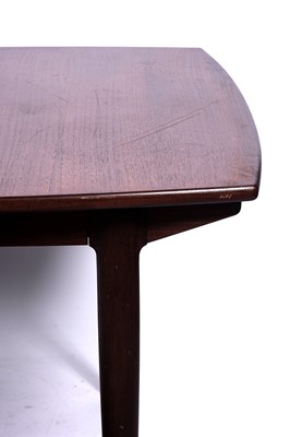 Lot 3 - Greaves and Thomas: an oblong teak extending dining table and eight chairs