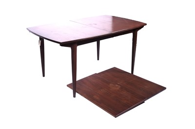 Lot 3 - Greaves and Thomas: an oblong teak extending dining table and eight chairs