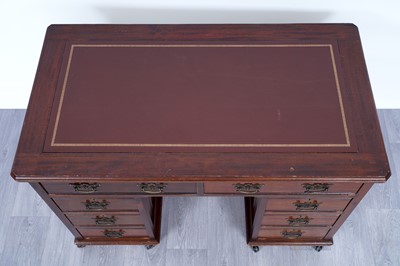 Lot 47 - A Georgian-style mahogany kneehole desk