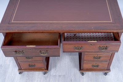 Lot 47 - A Georgian-style mahogany kneehole desk