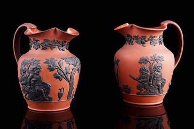 Lot 434 - A pair Wedgwood Rosso Antico jugs