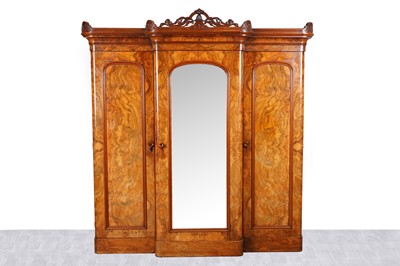 Lot 46 - A Victorian burr walnut breakfront triple wardrobe