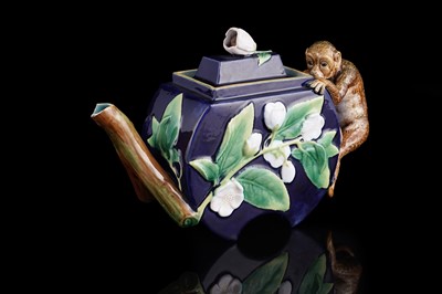 Lot 431 - A George Jones majolica monkey teapot