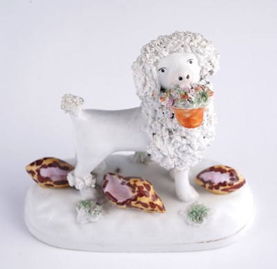 Lot 414 - Five Staffordshire poodles