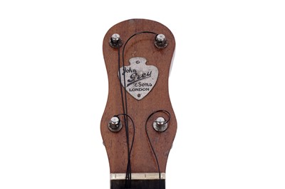 Lot 57 - A John Grey banjolele; and an eight-string lute