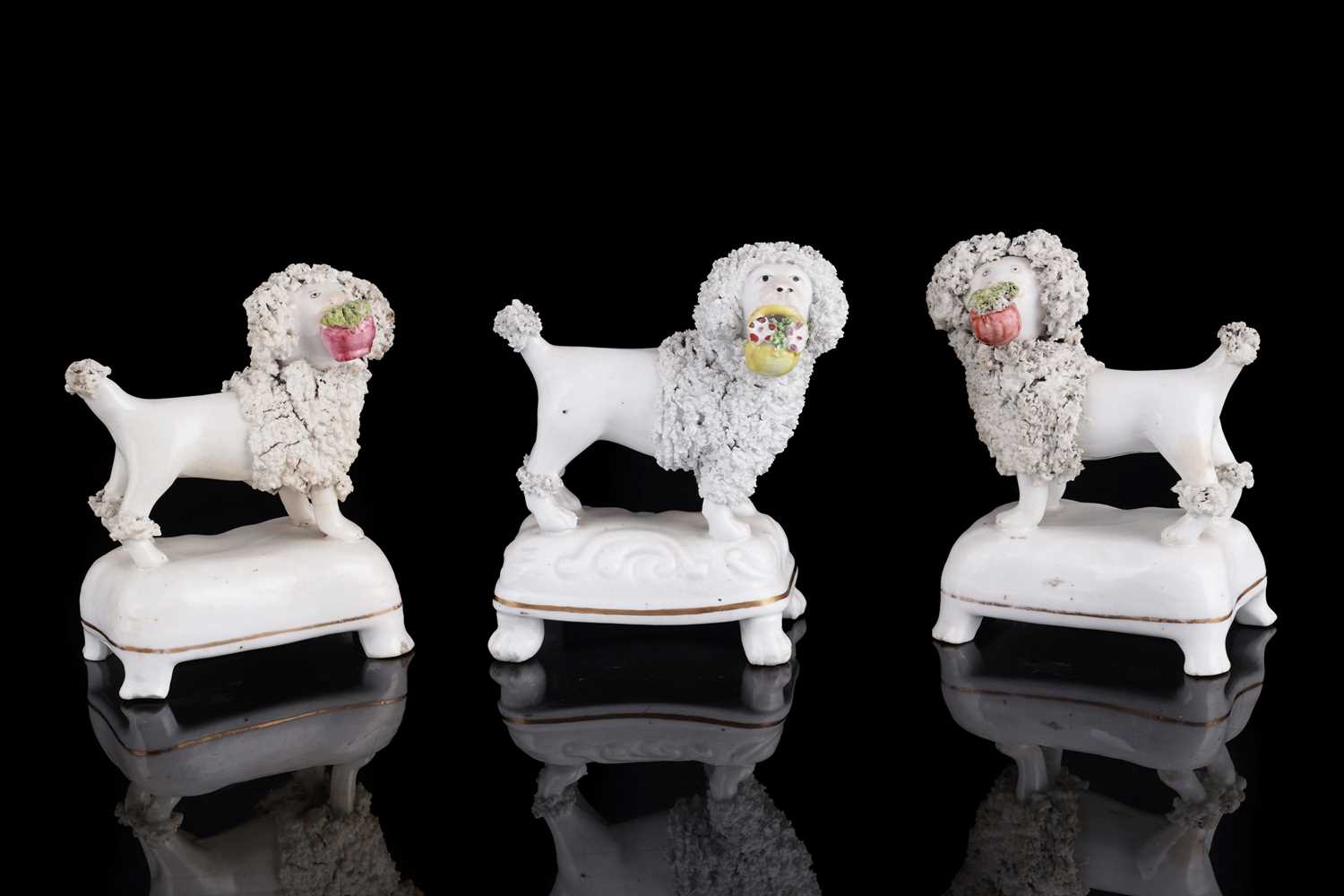 Lot 415 - Three Staffordshire poodles
