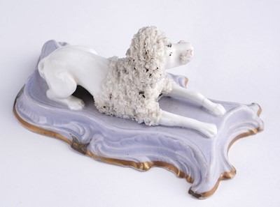 Lot 416 - Four Staffordshire porcelaneous dogs