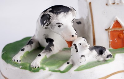 Lot 418 - Two Staffordshire dog inkstands; and two spaniels