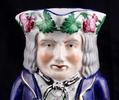 Lot 442 - A Staffordshire Toby Jug