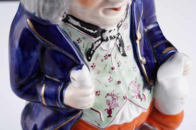 Lot 442 - A Staffordshire Toby Jug