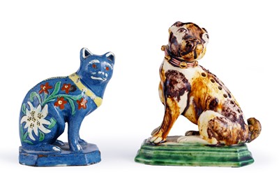 Lot 460 - A Caldas pug; and a Swiss cat money box