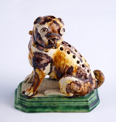 Lot 460 - A Caldas pug; and a Swiss cat money box