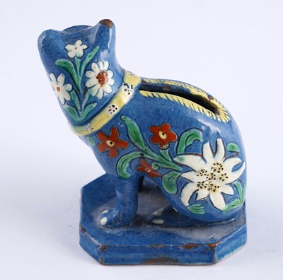 Lot 460 - A Caldas pug; and a Swiss cat money box