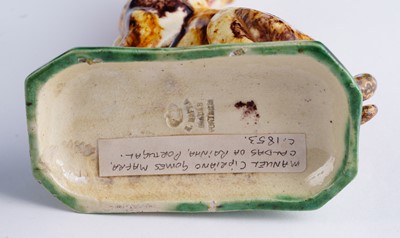 Lot 460 - A Caldas pug; and a Swiss cat money box