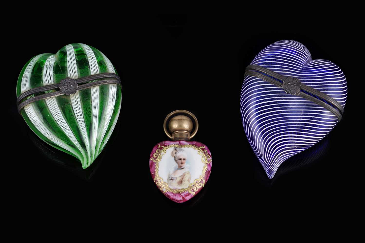 Lot 473 - Two Murano glass heart-shaped bonbonnieres; and a scent bottle