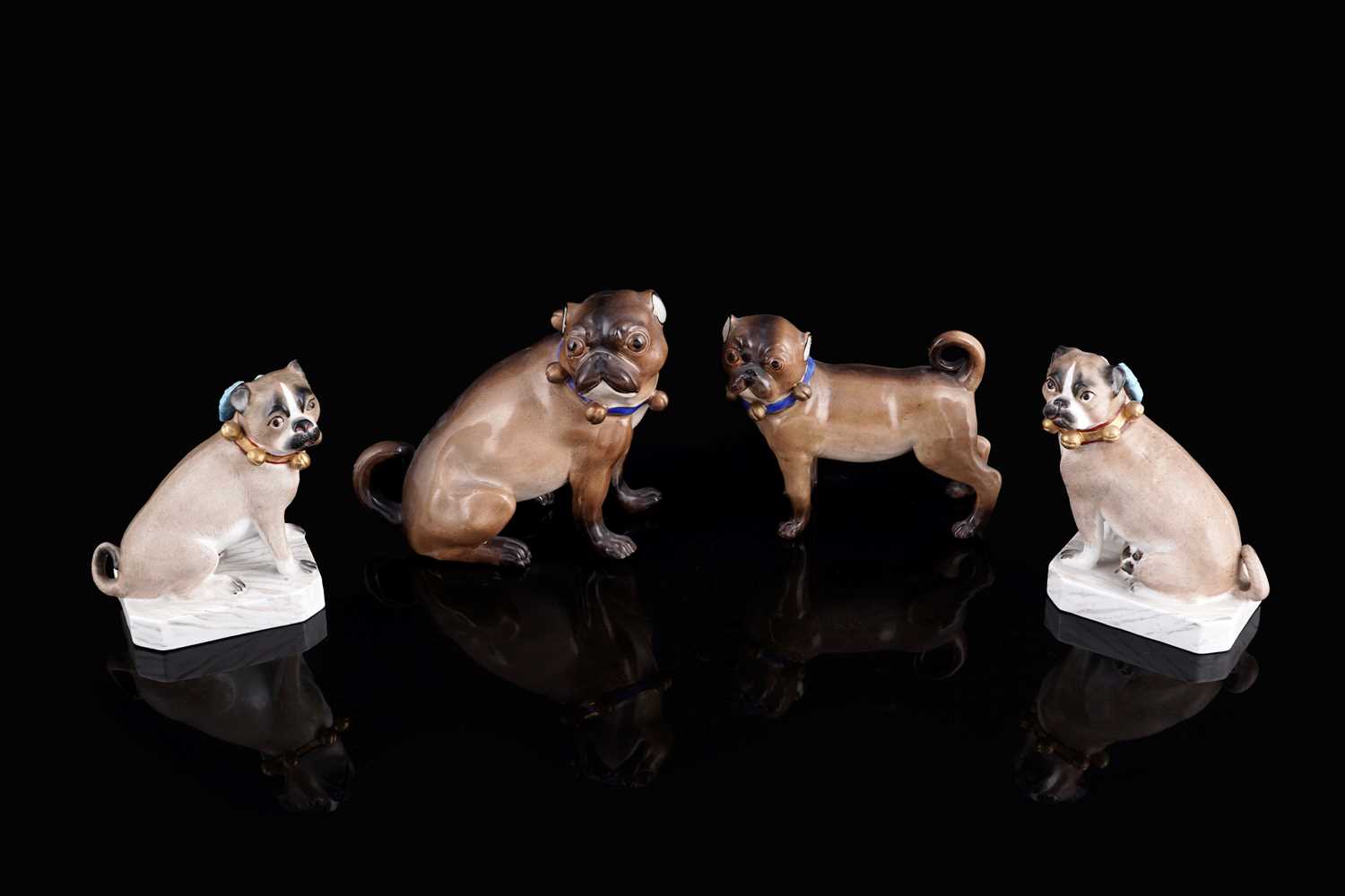 Lot 461 - A pair of continental pugs; and two others