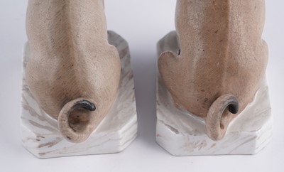 Lot 461 - A pair of continental pugs; and two others