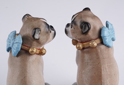 Lot 461 - A pair of continental pugs; and two others
