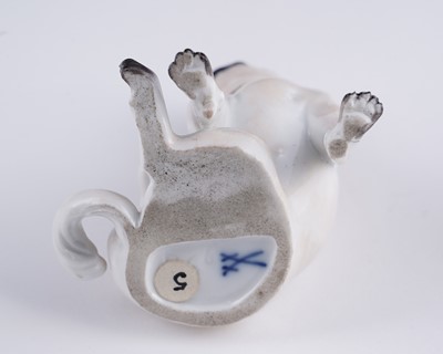 Lot 468 - A pair of Meissen pugs; and another