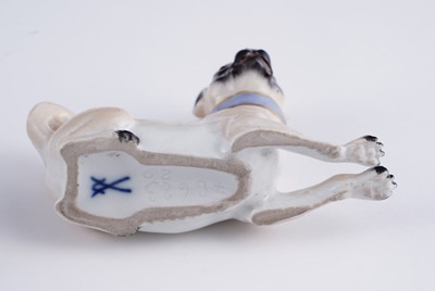 Lot 468 - A pair of Meissen pugs; and another