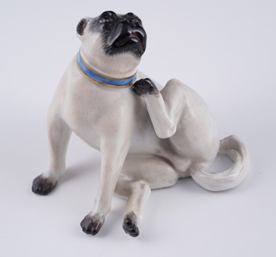 Lot 468 - A pair of Meissen pugs; and another