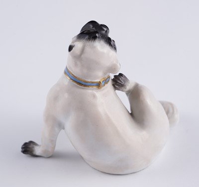 Lot 468 - A pair of Meissen pugs; and another