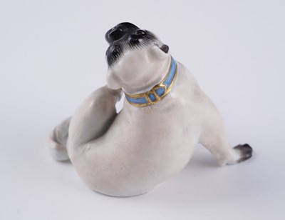 Lot 468 - A pair of Meissen pugs; and another