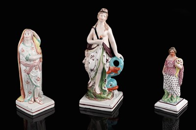 Lot 424 - Three Staffordshire figures