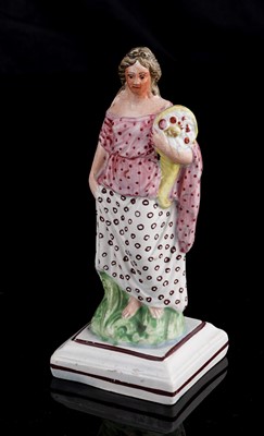 Lot 424 - Three Staffordshire figures
