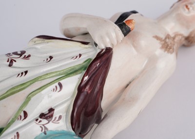 Lot 424 - Three Staffordshire figures