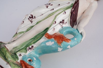 Lot 424 - Three Staffordshire figures