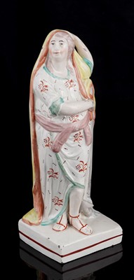Lot 424 - Three Staffordshire figures