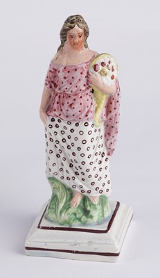 Lot 424 - Three Staffordshire figures
